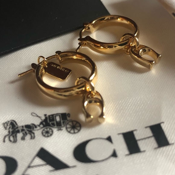 Coach Jewelry - 💋  Gold coach hoop earring with dangle
